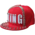 Red punk hip-hop baseball cap featuring white acrylic KING letters and silver metal rivets - One Size (55-60cm Adjustable) / Red King