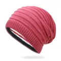 Stylish winter watermelon red knitted beanie featuring a black and white striped brim - One Size / Watermelon red