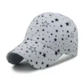 Stylish white unisex baseball cap featuring a black star print pattern for sun protection - Adjustable (56-60cm) / White with Black Stars