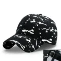 Stylische schwarze Baseballkappe mit weißem Farbspritzermuster und Metallschnalle - Verstellbar (56-60cm) / Tintenspritzer Schwarz