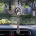 Crystal car hanging ornament detail, sparkling faceted glass ball pendant for rearview mirror decor. - Colorful
