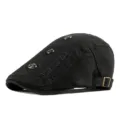 Black vintage newsboy beret hat with freestyle embroidery and metal rivets detail - Adjustable for 55-59cm Head Circumference / Three Button Style / Black
