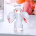 Exquisite faceted crystal angel figurine with wings and halo on a bright background - Angel Ornament / Clear