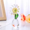 Elegant detailed shot of a sparkling crystal sunflower figurine in a faceted clear vase - Daisy Ornament / Yellow