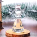 Detailed view of a faceted crystal angel figurine with a elegant geometric design - Transparent Angel Ornament