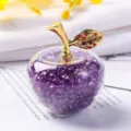 Macro view showing the intricate details of a crystal apple filled with purple gems. - Gift Box / Purple