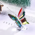 Detail shot of a colorful faceted crystal butterfly ornament on a crystal base - Colorful Butterfly