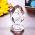 Faceted crystal ornament featuring internal 3D laser engraved praying hands and cross - Praying Hands Internal Engraving Ornament / Clear