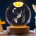 Detail view of a crystal ball night light featuring 3D fetus ultrasound engraving on wood base - Style 1 / 6cm With Base