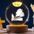 Close-up of 3D engraved fetus ultrasound inside a crystal ball night light on wooden base - Style 4 / 6cm With Base