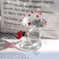 Detailed macro shot of faceted crystal mushroom figurine with red ladybug decoration - Mushroom Ladybug Ornament / Red