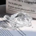 Detailed close-up of a clear crystal turtle figurine with elegant light refraction - Little Turtle Ornament / Clear
