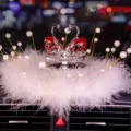 Elegant crystal swan couple car dashboard ornament with soft white feathers and pearls - Swan With Pearl Feather Pad / Red Eye Red