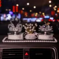 Luxury crystal car interior ornaments set with swan and apple on a pearl-rimmed mat. - Double White Swan and White Apple Set (with Pearl Anti-slip Mat) / White