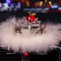 Luxury red crystal apple car ornament featuring a white swan feather ring and elegant silver crown - Apple Crown Base With Feather Pad / Red