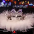 Luxury crystal swan car dashboard ornament featuring white feathers and purple accents - Swan Crown Base With Feather Pad / Red Eye Purple