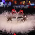 Elegant crystal swan car dashboard ornament with white feathers and red gems decoration - Swan With Crown Base And Feather Pad / Red Eye Red