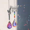 Schmetterling-Sonnenfänger mit einem Regenbogen-Kristalltropfen und sieben Chakra-Perlen - Schmetterling-AB Farbe 50mm Konkave Longan