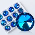 Macro detail of brilliant blue faceted crystal pendant with hanging hole for DIY jewelry. - Aurora Blue (Crystal Pearl 13) / 16mm (12 Pieces/Pack)