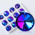 Macro view of Aurora AB faceted crystal pendants showing deep blue and purple reflections - Aurora Blue-Purple (Crystal Pearl 13) / 16mm (12 Pieces/Pack)