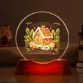 Detailed view of the warm glowing gingerbread cottage club night light ornament - Gingerbread House Style / 6cm Crystal + USB Warm Light Base
