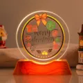 Detailed macro view of Merry Christmas engraved acrylic night light with warm LED glow - Style 18 / 6cm Crystal + USB Warm Light Base