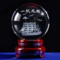 Crystal ball ornament with wooden base, 3D laser engraved sailboat design for home decor gift. - Smooth Sailing Crystal Ball + Base / 60mm