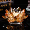 Amber crystal lotus candle holder with faceted petals for home decor or meditation - Orange