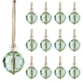 Set of 13 light green faceted crystal Christmas tree ornaments with elegant gold cords. - 13-Piece Set / Light Green Crystal Ball