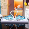 Pair of elegant clear crystal swan figurines with blue faceted wings for decor - Swan Crystal Ornament Style 2 With White Tray / Blue