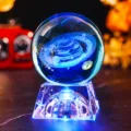 Detail view of 3D laser engraved Saturn crystal ball on lighted base - Saturn (JYSJ-SJQ-019) / Color 60 Ball With Rechargeable Color Light Crystal Base