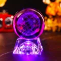 Close-up of 3D laser engraved globe crystal ball night light with purple LED - Earth (JYSJ-SJQ-019) / Color 60 Ball With Rechargeable Color Light Crystal Base