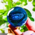 Detailed macro shot of 3D galaxy carving inside a clear blue crystal ball - Galaxy (JYSJ-SJQ-019) / 60 Single Sphere