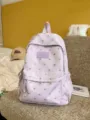 Lightweight purple casual backpack for students featuring a silver glittery heart pattern - With Pendant / Violet