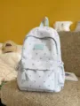 Lightweight light blue student backpack with silver heart pattern and brand logo LXINDA - With Pendant / Light Blue