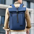 Professional blue business laptop backpack for men featuring a roll-top buckle design. - Blue