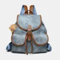 Retro suede backpack detail featuring contrast brown leather trim, front pockets and cute bear charm. - Blue