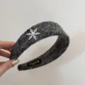 Detail shot of a gray plush headband featuring a sparkling rhinestone snowflake ornament - Gray - Snowflake Headband