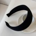 Elegant wide black ribbed sponge headband for a minimalist and stylish hair accessory look - 5cm Wide / Black
