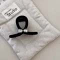 Elegant black flocked hair claw clip with a sparkling rhinestone bow detail. - Hair Claw / Large Bowknot