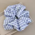 Detailed view of the soft blue and white striped fabric texture of a large hair scrunchie - Blue White Scrunchie - Plaid Grid