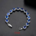 Elegante pulsera plateada de 17 cm con circonitas azules en forma de pera y halo - Paquete de 17cm / Azul