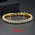 Elegante pulsera dorada de eslabones de corazón de 17 cm con circones brillantes. - Forma de Corazón / 17cm / Dorado