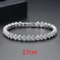 Elegante pulsera plateada para mujer con brillantes circonitas redondas, de 17 cm. - 17cm / Oro blanco
