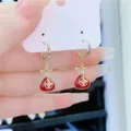 Festive red fortune bag hoop earrings with gold plating and sparkling crystal details - Short Ear Buckle Style (E1181) / Gold Red