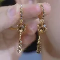 Vintage gold-toned geometric earrings featuring sparkling brown crystal tassels - Geometric Cube Tassel Style (E4383) / Champagne Rhinestone