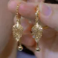 Elegant retro gold leaf tassel earrings paved with sparkling full rhinestones deco - Full Rhinestone Leaf Pendant Style (E4386) / Champagne