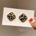 Retro leopard print square stud earrings with textured gold-tone metal borders. - Vintage Leopard Print Rounded Square Style (E4401) / Gold