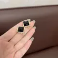 Detailed view of vintage square earrings featuring black gemstones and rhinestone halo. - Geometric Square / Black Style (E2008)