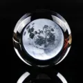 Detailed close-up of a transparent crystal ball with 3D laser engraved moon motif - Single Ball (Moon) / 40mm Ball With Warm Light Base